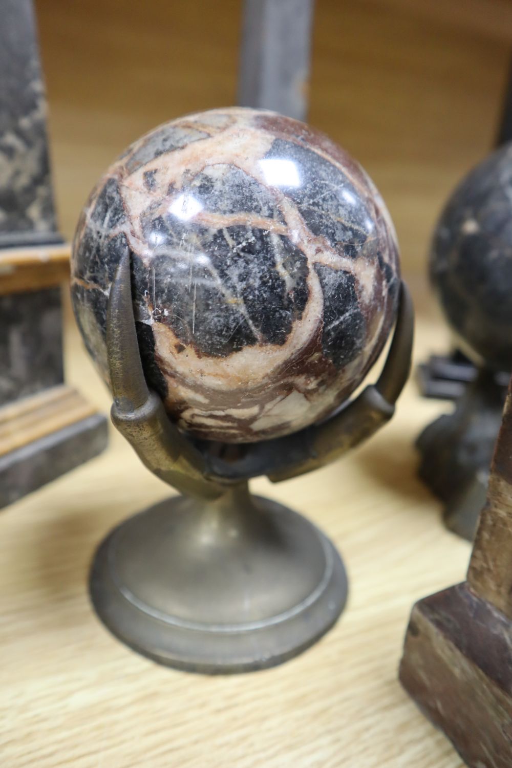 A group of marble obelisks and balls